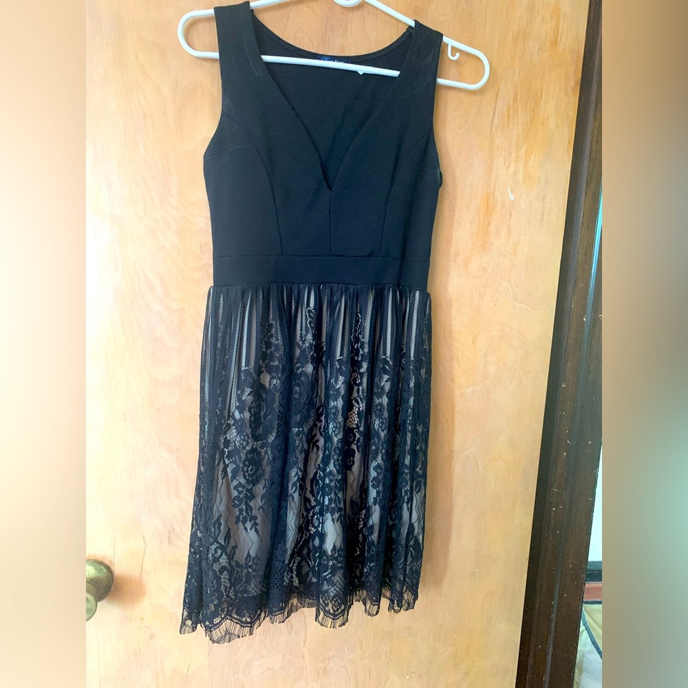Style/color- black dress.